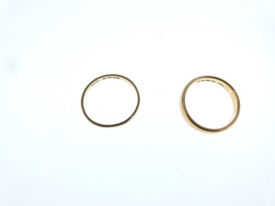 Lot 18 - Two 22ct gold wedding bands