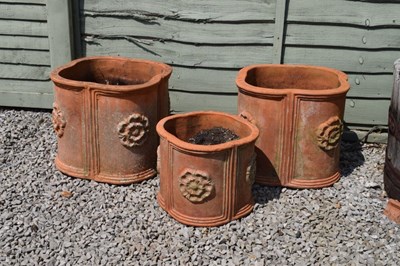 Lot 789 - Three quatrefoil terracotta planters