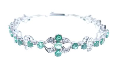 Lot 29 - Emerald and white stone bracelet