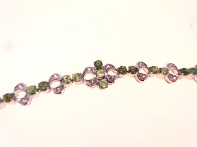 Lot 29 - Emerald and white stone bracelet