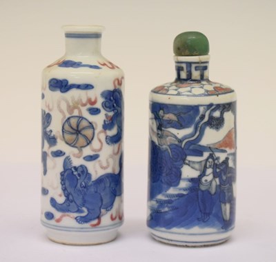 Lot 294 - Two Chinese blue and copper-red decorated porcelain scent bottles