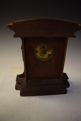 Lot 504 - Early 20th Century walnut-cased mantel timepiece