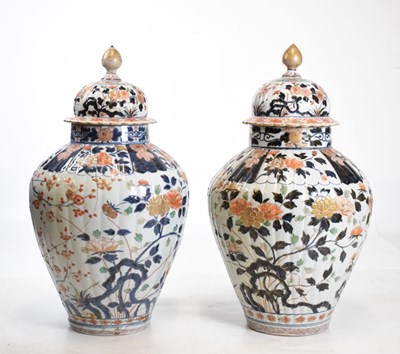 Lot 301 - Pair of Imari lidded vases