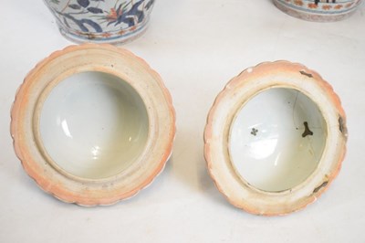 Lot 301 - Pair of Imari lidded vases