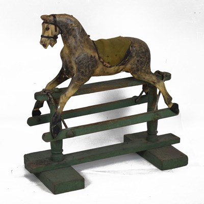 Lot 486 - Early 20th Century carved painted wooden rocking horse