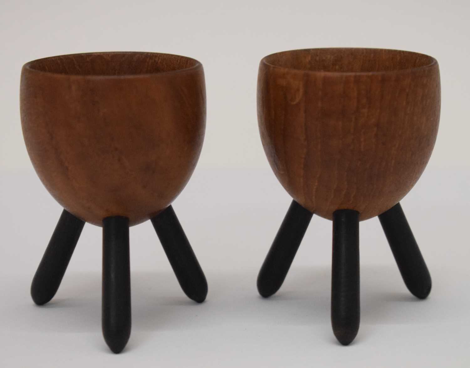 Lot 255 - Pair of mid Century treen egg cups