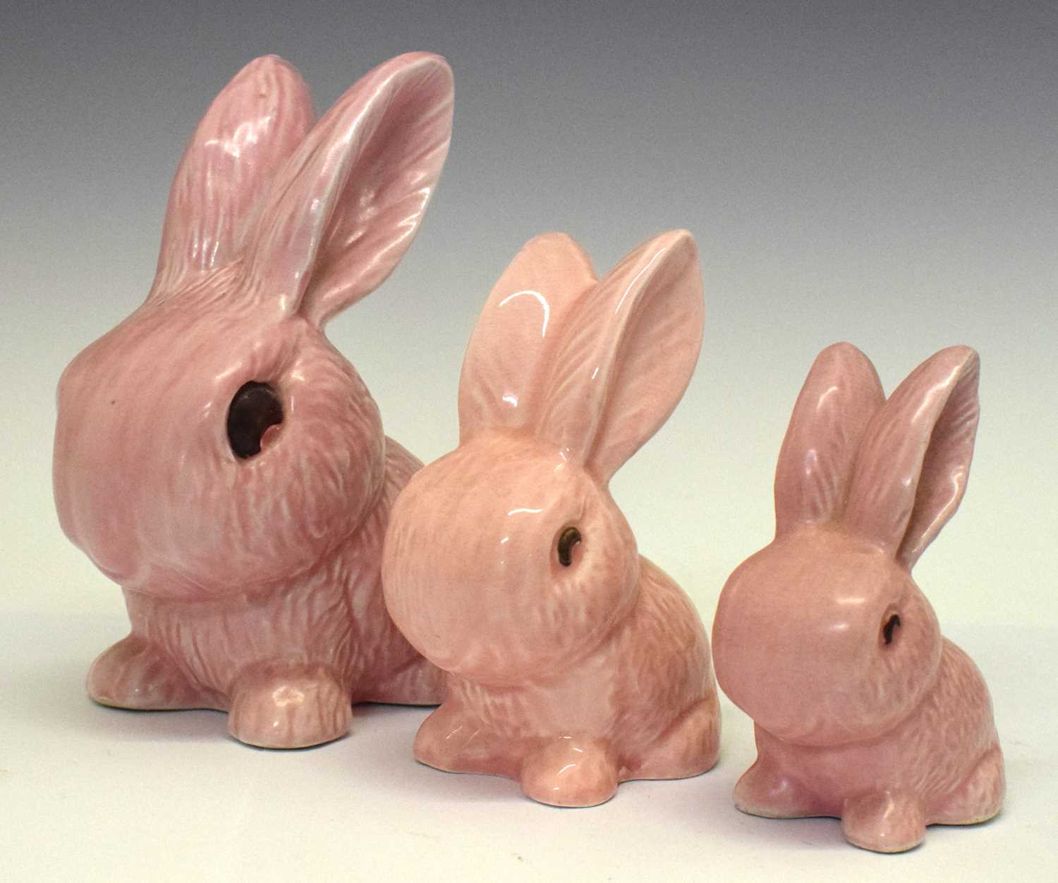 Lot 403 - Set of three graduated Sylvac rabbits
