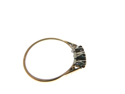 Lot 5 - Yellow metal (18ct and Plat) ring set three diamonds