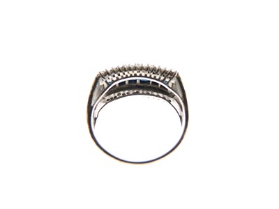 Lot 14 - White metal (14K) sapphire and diamond ring