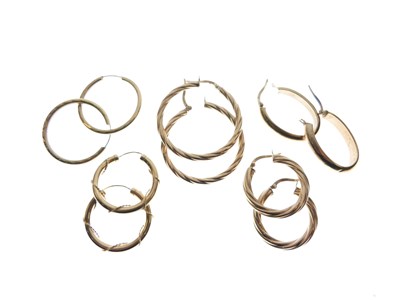 Lot 136 - Five pairs of 9ct gold and yellow metal hoop earrings