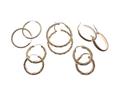 Lot 136 - Five pairs of 9ct gold and yellow metal hoop earrings