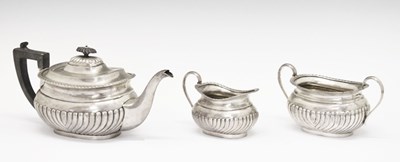 Lot 231 - Victorian silver gadrooned three-piece tea set
