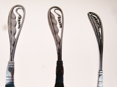 Lot 95 - Georg Jensen 'leaf & berry' handled silver pickle fork