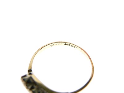 Lot 6 - Yellow metal (18ct and Plat) three-stone diamond ring