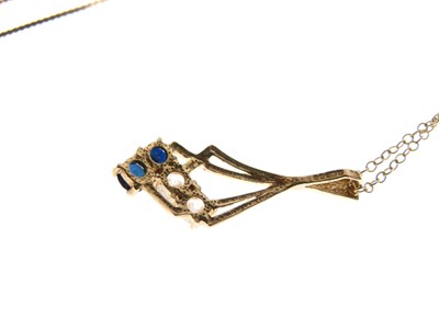 Lot 96 - 9ct gold pendant set two sapphires and two white stones