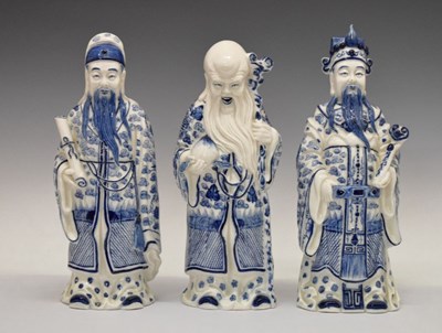 Lot 300 - Set of three Chinese blue and white porcelain 'Sanxing' figures