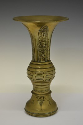 Lot 345 - Chinese bronze 'gu' vase, and brass bowl