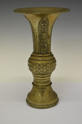 Lot 345 - Chinese bronze 'gu' vase, and brass bowl