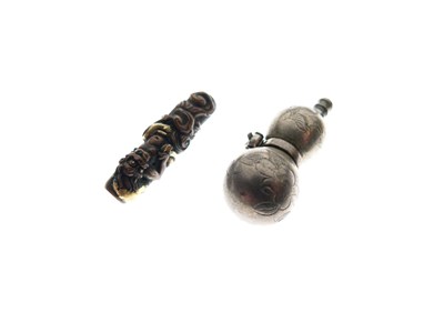 Lot 524 - Japanese Shakudo pipe section and gourd charm