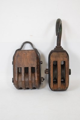 Lot 371 - Two elm pulleys