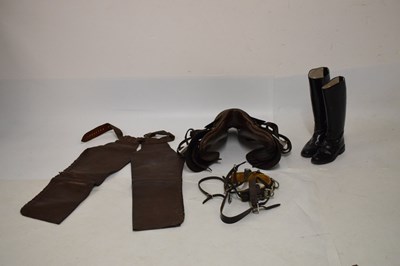 Lot 361 - Leather saddle, stirrup leathers and irons