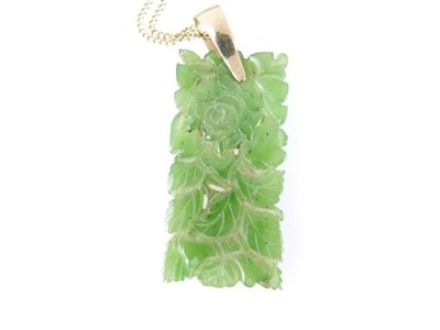 Lot 63 - Carved foliate jade panel pendant