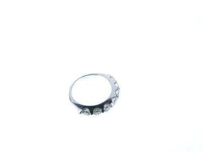 Lot 12 - Seven stone diamond half hoop ring
