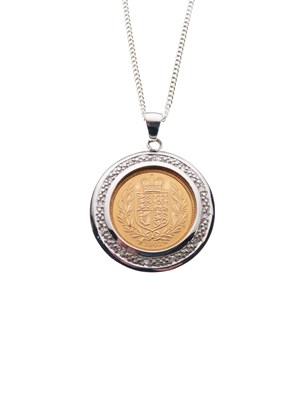 Lot 100 - Royal Mint Limited Edition 2002 half sovereign in 9ct white gold diamond-set pendant