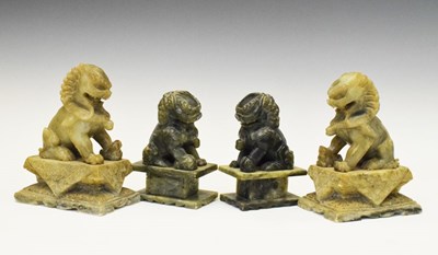 Lot 313 - Pair of Chinese carved green soapstone Dogs of Fo