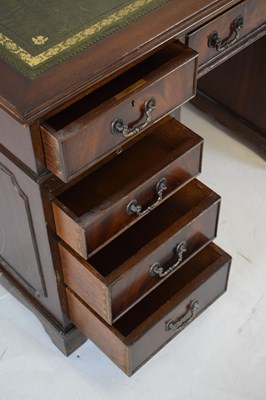 Lot 657 - Reproduction mahogany twin pedestal desk