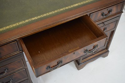 Lot 657 - Reproduction mahogany twin pedestal desk
