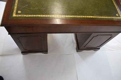 Lot 657 - Reproduction mahogany twin pedestal desk