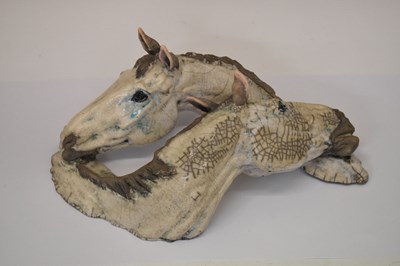 Lot 542 - Rudge Pottery - Resting horse heads sculpture