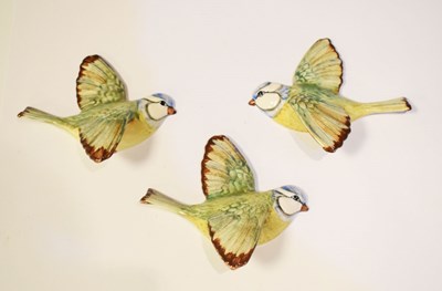 Lot 540 - Three Beswick blue tits