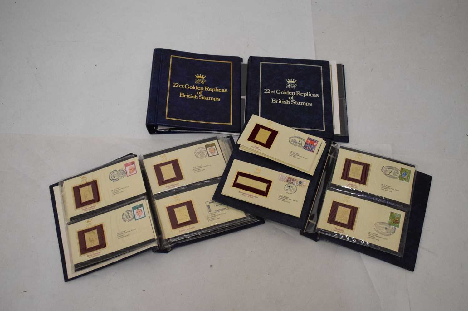 Lot 327 - 22ct Golden Replicas of British stamps in four albums