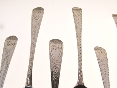 Lot 92 - Set of six George III silver teaspoons with bright cut decoration