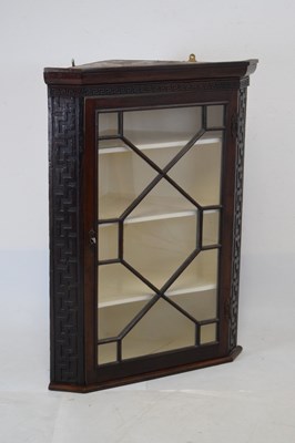 Lot 717 - George III mahogany corner cabinet