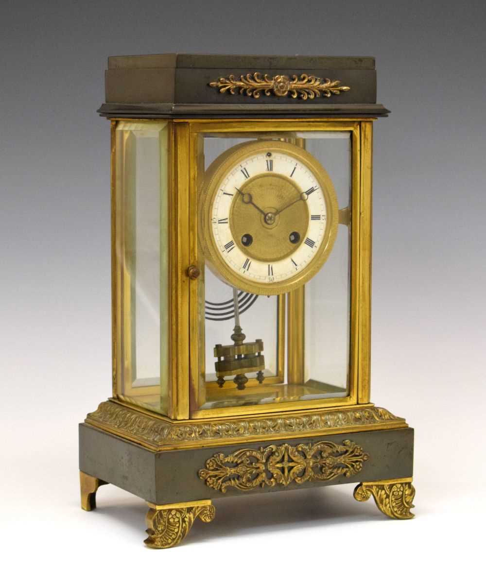 Lot 545 - French lacquered and anodised brass four-glass mantel clock