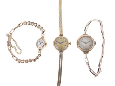 Lot 216 - Three 9ct gold cocktail watch heads