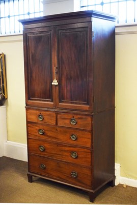 Lot 595 - Mahogany linen press