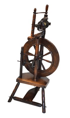 Lot 230 - Oak spinning wheel