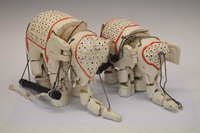 Lot 394 - Two vintage wooden painted elephant puppets