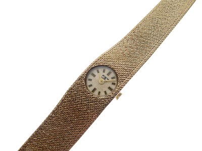 Lot 219 - Technos - Lady's 9ct gold bracelet watch