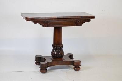 Lot 554 - Victorian rosewood pedestal card table