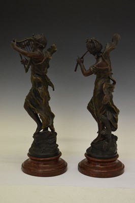 Lot 654 - Pair of early 20th Century bronzed spelter figures on pedestal bases