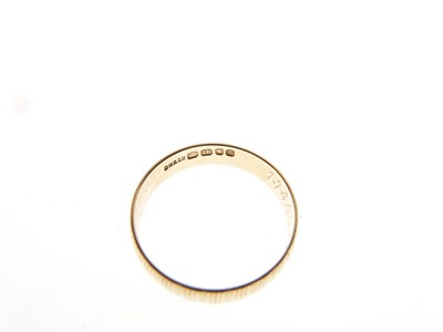 Lot 53 - 18ct gold engraved wedding band, and a 9ct gold signet ring