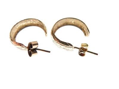 Lot 134 - Three pairs of 9ct gold hoop earrings