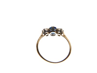Lot 20 - Sapphire and diamond three-stone ring