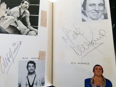 Lot 259 - Two books of wrestling autographs