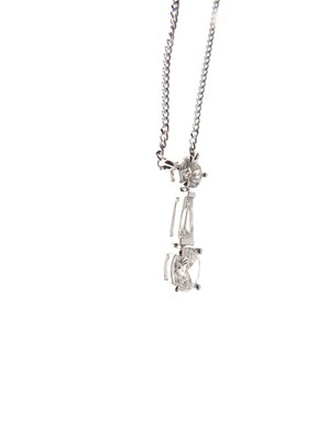 Lot 103 - 18ct white gold three-stone diamond pendant